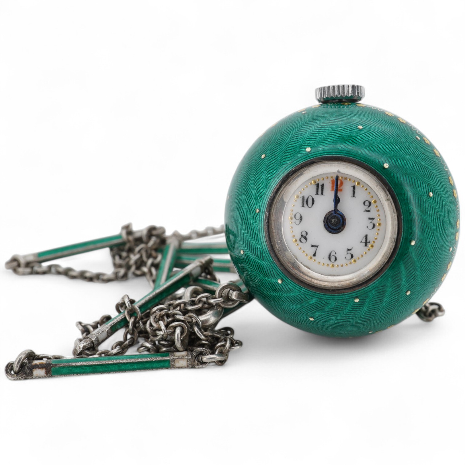 An early to mid 20th century 925 and green enamel globe pendant watch, with Arabic dial and gilt highlights, diameter 22mm, on a 925 and green and white enamel baton link chain, 62cm.